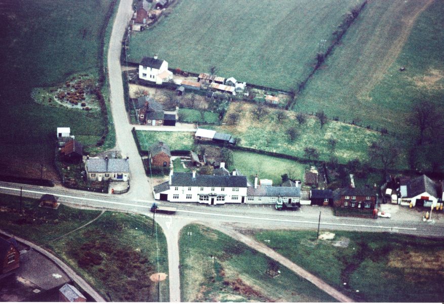 An aerial view of Hankelow village centre looking east in April 1967