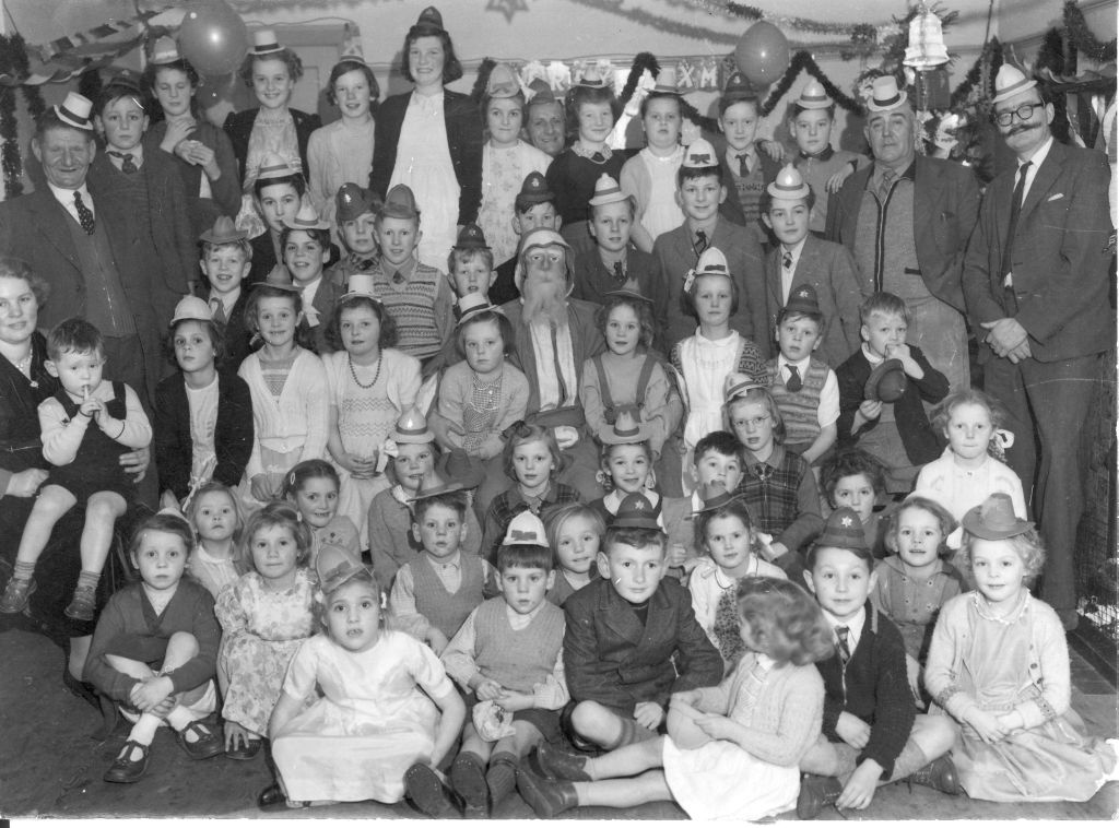 A children's Christmas party in the White Lion in 1955