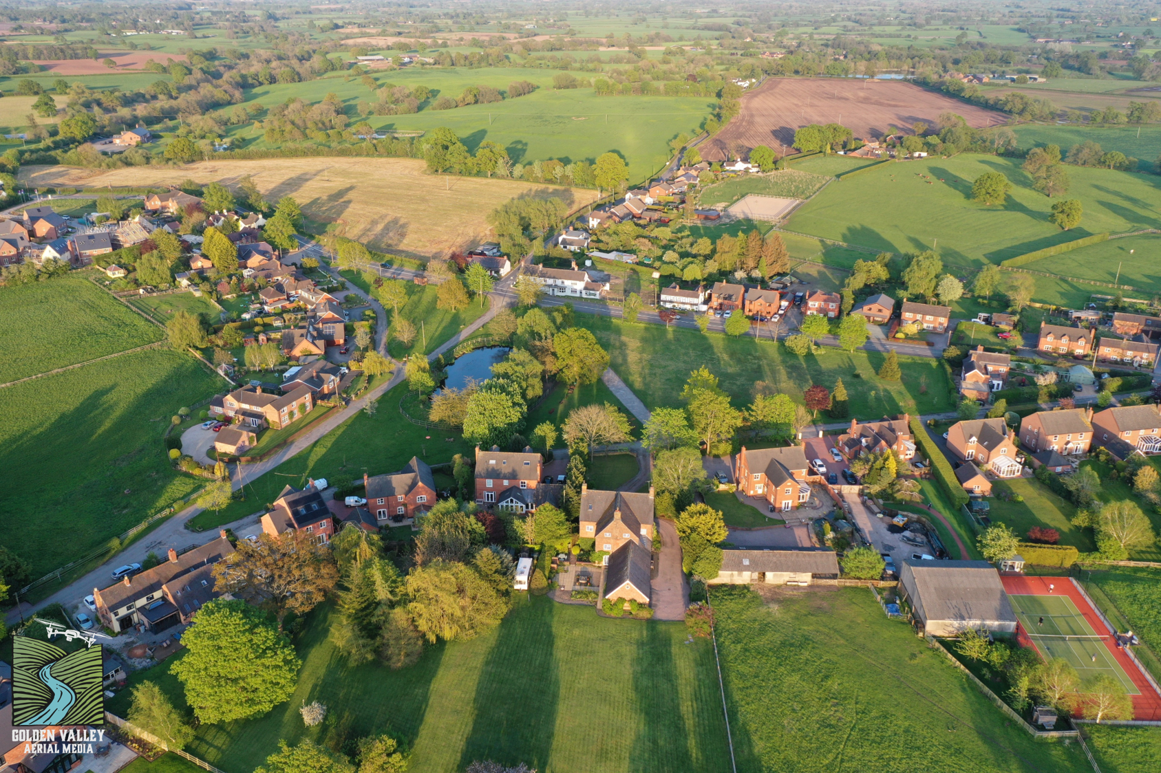 An aerial photograph of the village taken in April 2019 - image © Golden Valley Aerial Media